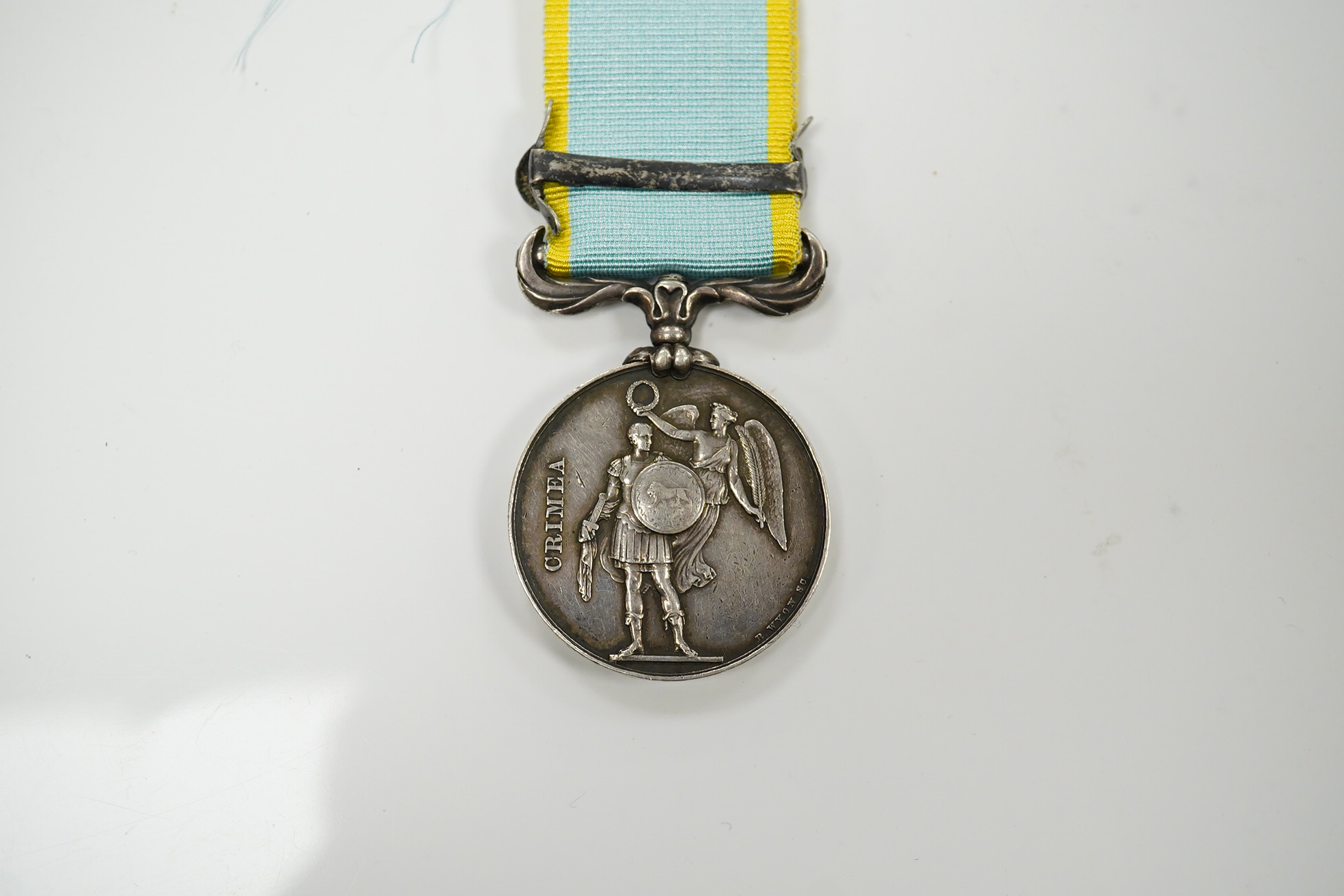 A Crimea medal with Sebastopol clasp. unnamed as issued